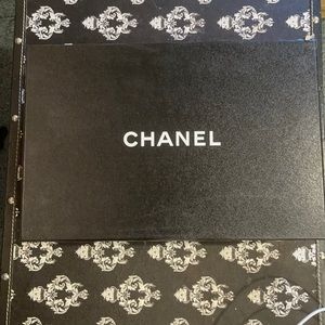 Chanel shoebox with tissue paper and dust bags